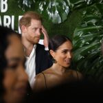 Prince Harry and Meghan Markle dazzle on red carpet at the premiere of 'Bob Marley: One Love' in the legendary musician's hometown of Kingston, Jamaica. The A-list couple were unexpected guests for media gathered at the glitzy screening of Paramount's biopic at the Carib Theatre on Tuesday night. They walked the red carpet hand-in-hand, with Meghan in a black spaghetti strap gown while Harry went with a suit sans tie.  The visit marks a return trip to the island nation for 38-year-old Prince Harry and his wife, 42. Prior to their engagement, the duo enjoyed a  trip to Montego Bay, on the north coast, for the 2017 wedding of Harry's pal Tom “Skippy” Inskip to Lara Hughes-Young., The movie musical hits theaters on February 14, starring Kingsley Ben-Adir as the reggae superstar and Lashana Lynch as his wife, Rita.
23 Jan 2024,Image: 839982165, License: Rights-managed, Restrictions: World Rights, Model Release: no, Pictured: Meghan Markle, Prince Harry at Carib Theater, Kingston, Jamaica, Credit line: MEGA / The Mega Agency / Profimedia