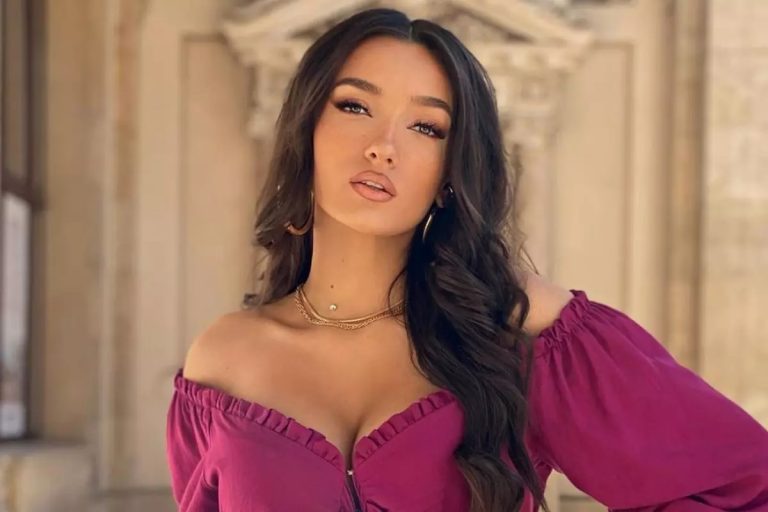 Viviana Sposub, apariție de infarct într-un top decoltat și provocator. Iubita lui George Burcea și-a expus bustul generos la o petrecere pe plajă FOTO